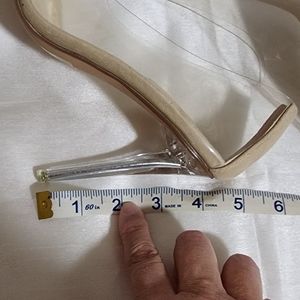 Clear pointy high stilettos
